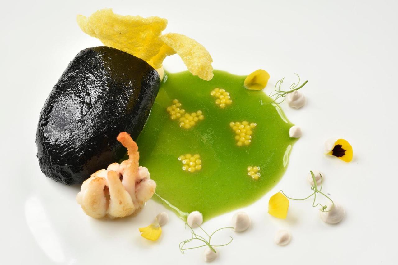 Swiss Diamond Hotel & Spa Morcote Esterno foto A dish by chef Massimo Botta