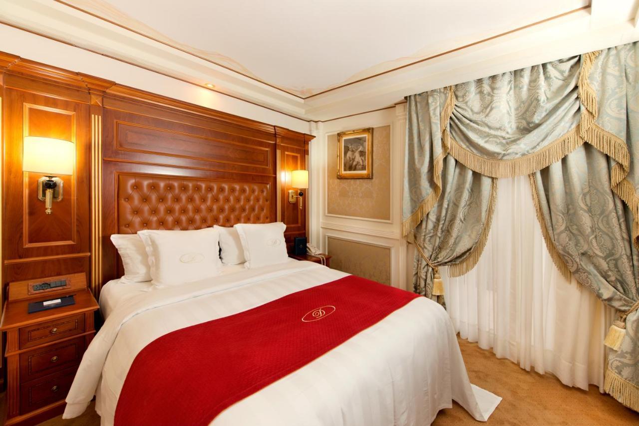 Swiss Diamond Hotel & Spa Morcote Esterno foto A bedroom at the hotel